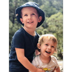 Two boys in a blue hat and a hat.