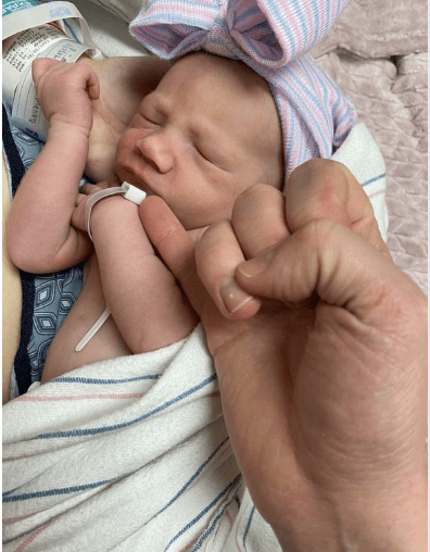 Newborn baby girl sleeping in hospital.