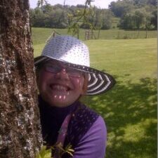 A woman wearing a hat.